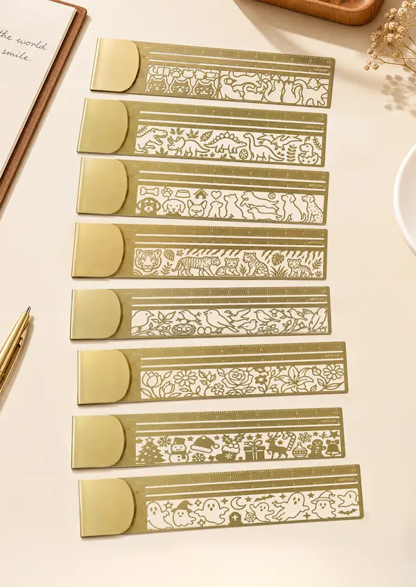 Decorative metal bookmark ruler features and uses